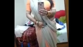 Desi Bhabhi in saree showing huge boobs  Bangla
